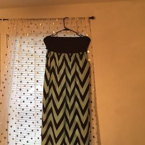 A strapless black and teal dress